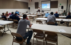 Tom Eckberg, IDL Forest Health Lands Program Manager speaks to workshop attendees in Idaho Falls about the Emerald Ash Borer. There were 15 in person attendees and an additional 11 who attended the webinar. Photo credit; G. Bates